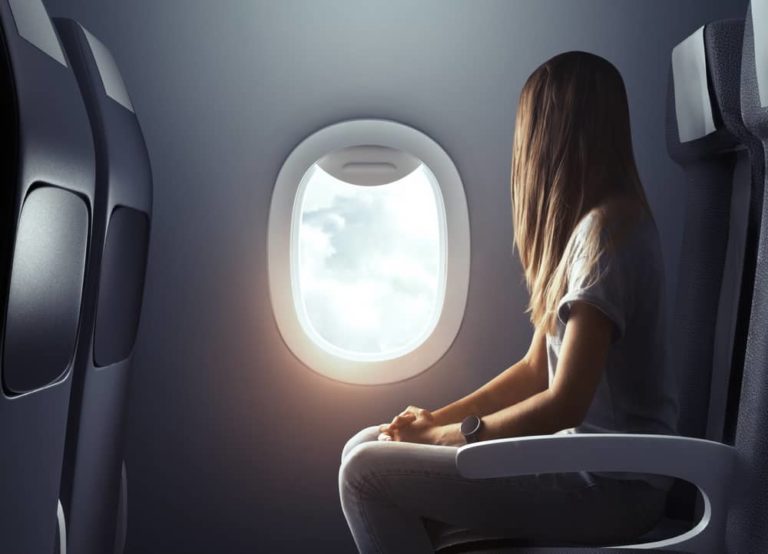 12 Travel Tips for How to Survive a Long Flight