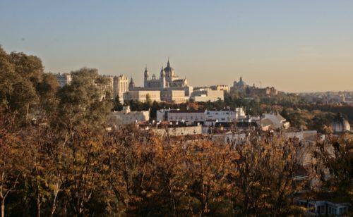 A view of the Madrid palace and cathedral in fall © Lori Zaino