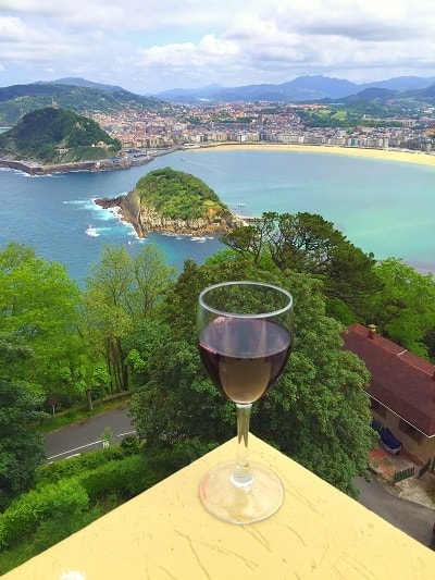 The view with a glass of Ribera del Duero Reserva wine from the top of Monte Igueldo, in San Sebastian, Spain. Image courtesy Greig Santos-Buch.