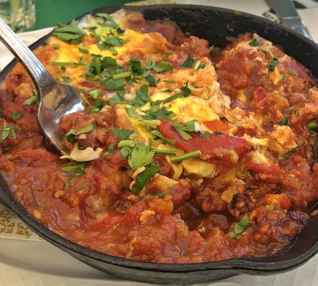 Shakshuka, a dish with eggs, tomato and spices