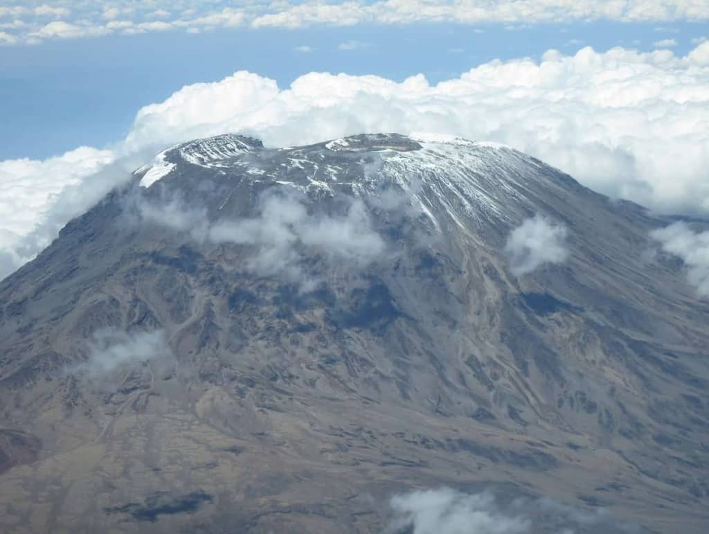 Here's what you need to know about hiking Mt. Kilimanjaro. This Kilimanjaro itinerary covers everything from when to hike the mountain, cost, route, day-by-day itinerary, equipment, camp sites, traveler information, elevations, trail distances, hike time and much more.