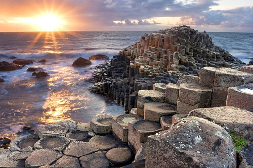 An epic sunset on giant's causeway in Northern Ireland, UK
