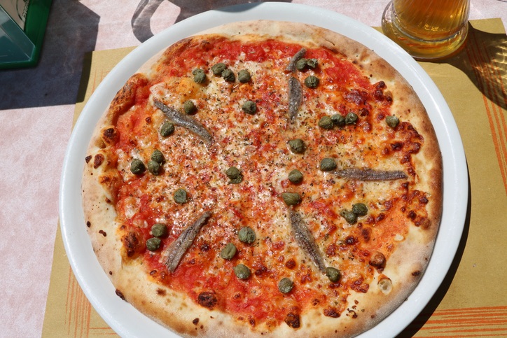 Anchovy pizza just out of the oven