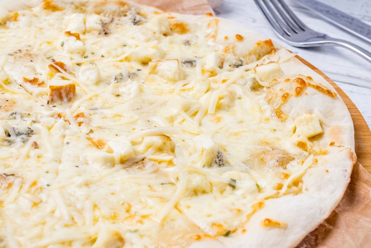 Up close picture of white pizza