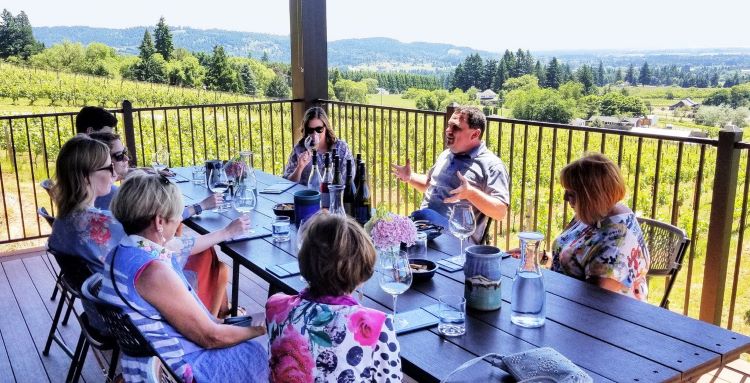 Dave Specter at Bells Up Winery conducting a private tasting on the outside deck