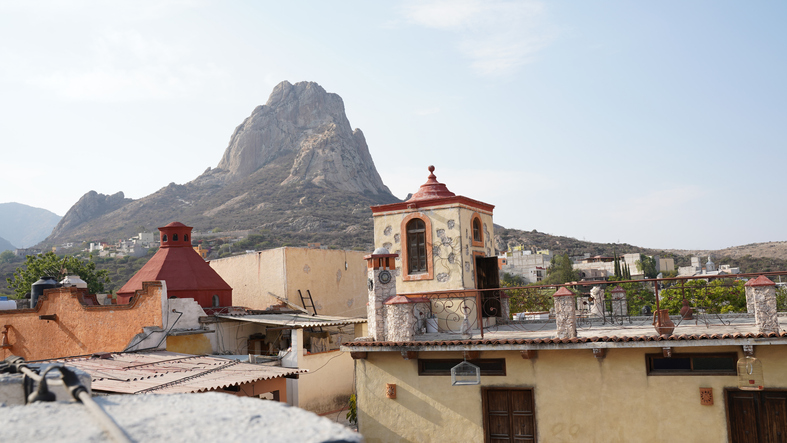 Peña de Bernal City and monolith rock formation in Querétaro state of central Mexico.