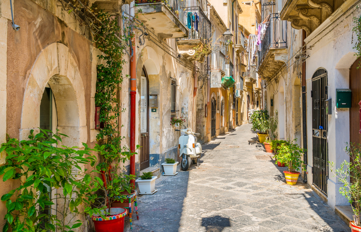 Navigating the timelessly classic streets of Syracuse within Sicily.