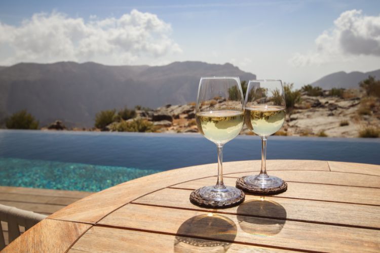 Drinking white wine in Maui