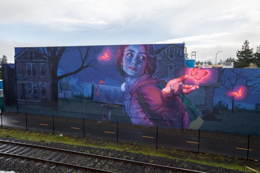 A large outdoor mural in the Rail Arts District along the Napa Valley Vine Trail