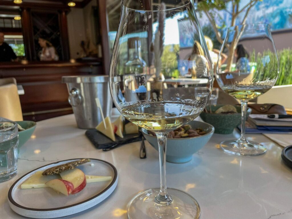 Chardonnay and a charcuterie board at Alpha Omega Collective in Downtown Napa