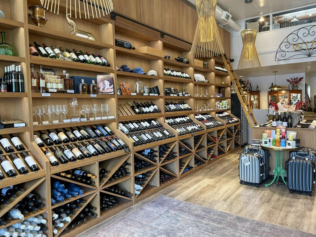 The wall of wine bottles at Maison Fayard in Downtown Napa