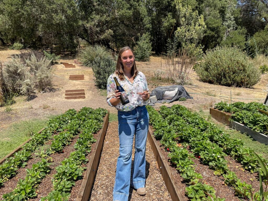 Winemaker Kira Ballota pouring at Tom Girl Farm near Napa